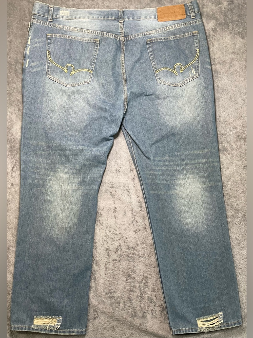 Men's Light Blue Distressed Jeans. 46X32